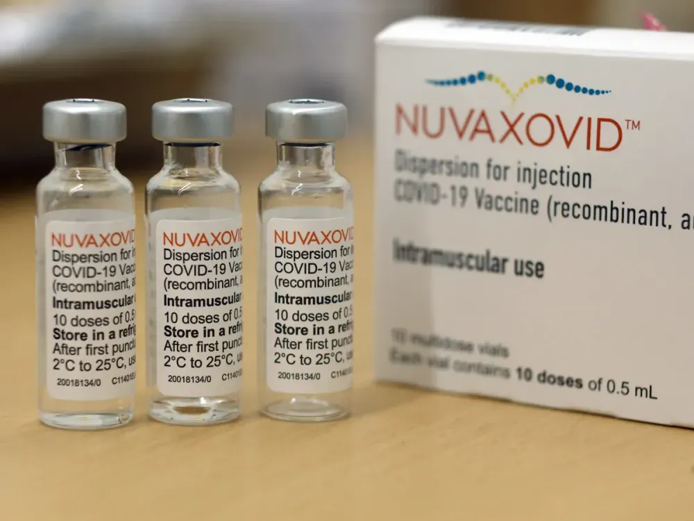  Ampoules containing the new Corona vaccine Nuvaxovid from the manufacturer Novavax sit on a table at a vaccination center. Photo: Matthias Bein/dpa (Photo by Matthias Bein/picture alliance via Getty Images)