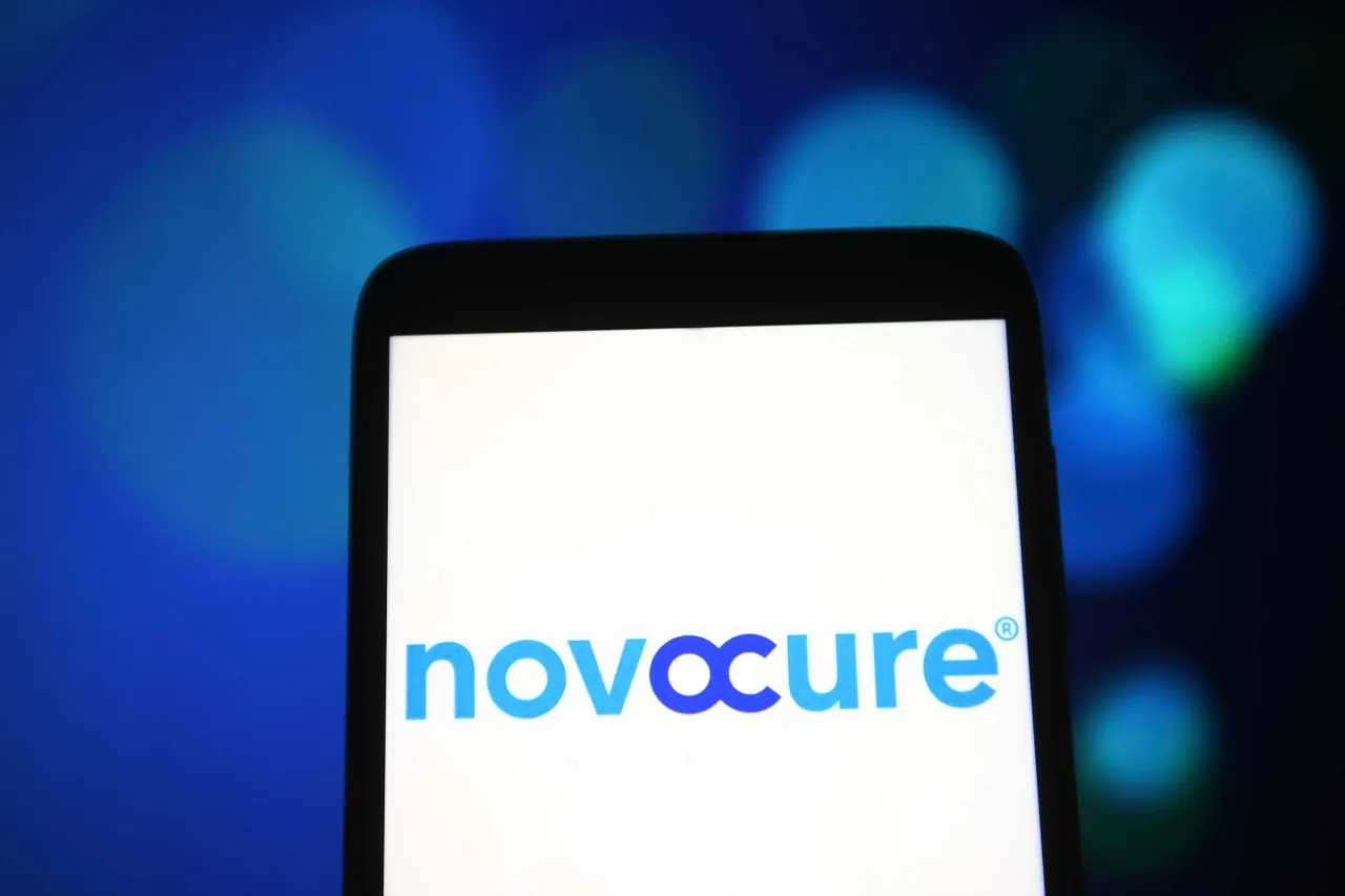 In this photo illustration, NovoCure Limited logo is seen on a smartphone screen. (Photo Illustration by Pavlo Gonchar/SOPA Images/LightRocket via Getty Images)