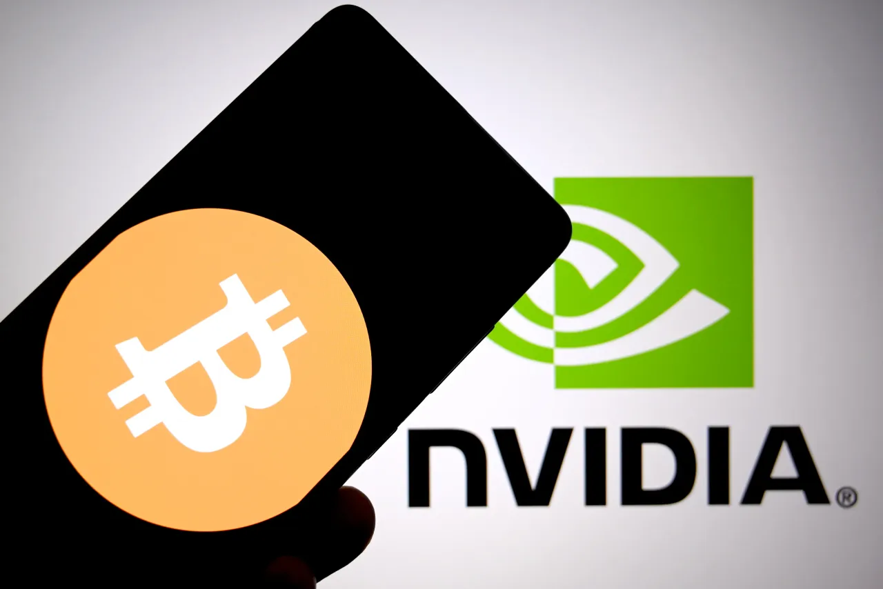In this photo illustration, the Bitcoin logo is seen displayed on a smartphone with the Nvidia logo in the background. (Photo Illustration by Avishek Das/SOPA Images/LightRocket via Getty Images)