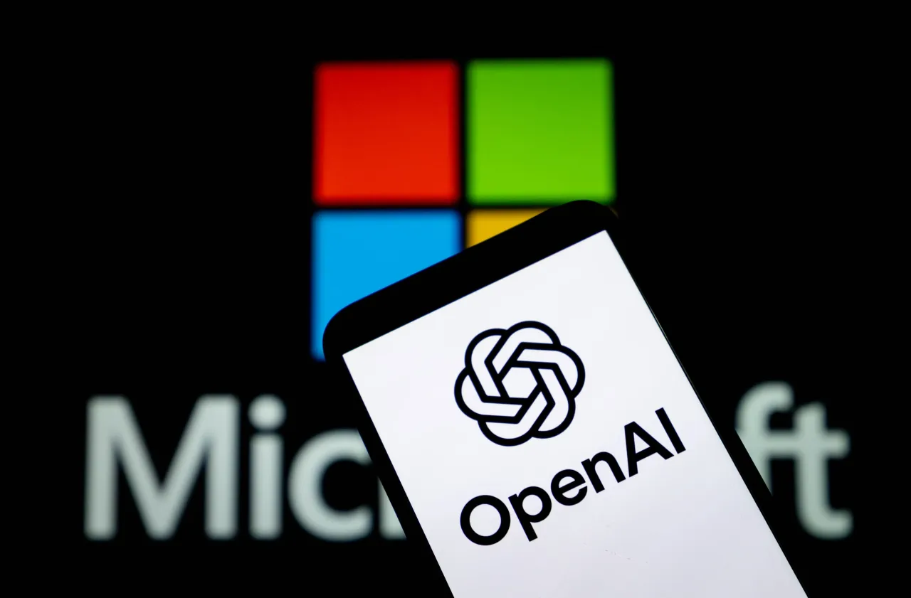 An illustration photo shows the OpenAI logo displayed on a smartphone with the Microsoft logo in the background in Chongqing, China on August 27, 2025. (Source: CFOTO/Future Publishing via Getty Images)