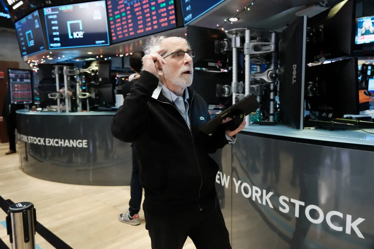 Stock trader Peter Tuchman works on the floor of the New York Stock Exchange (NYSE) on December 15, 2022 in New York City. (Photo by Spencer Platt/Getty Images)