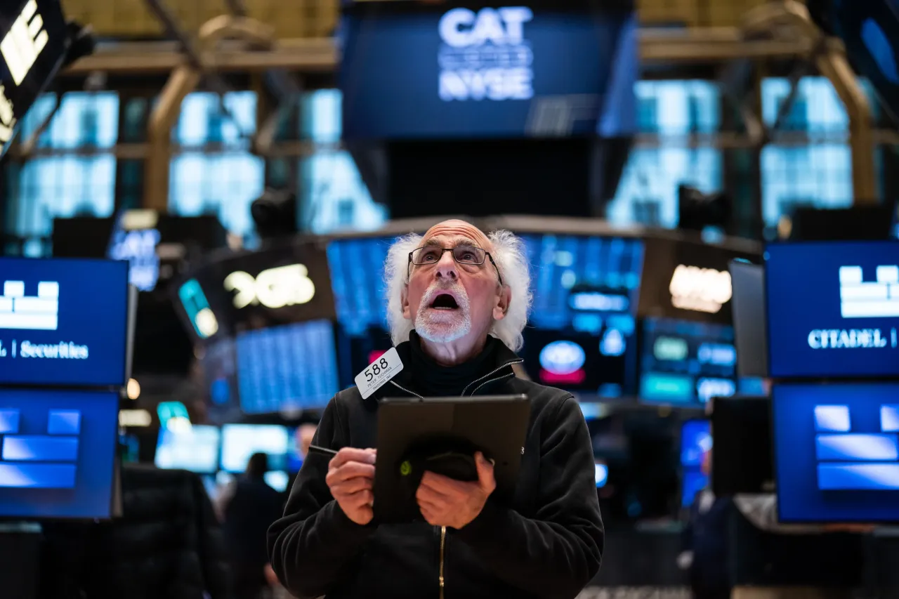 Trader Peter Michael Tuchman reacts as he works on the floor of the New York Stock Exchange during morning trading on April 15, 2025 in New York City. (Photo by Adam Gray/Getty Images)