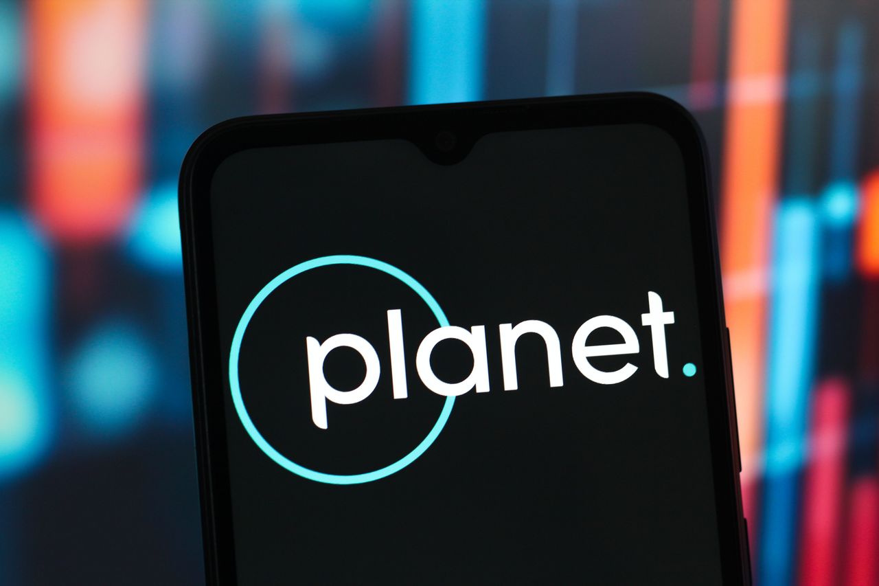 In this photo illustration, the Planet Labs logo is seen displayed on a smartphone screen. (Photo Illustration by Thomas Fuller/SOPA Images/LightRocket via Getty Images)