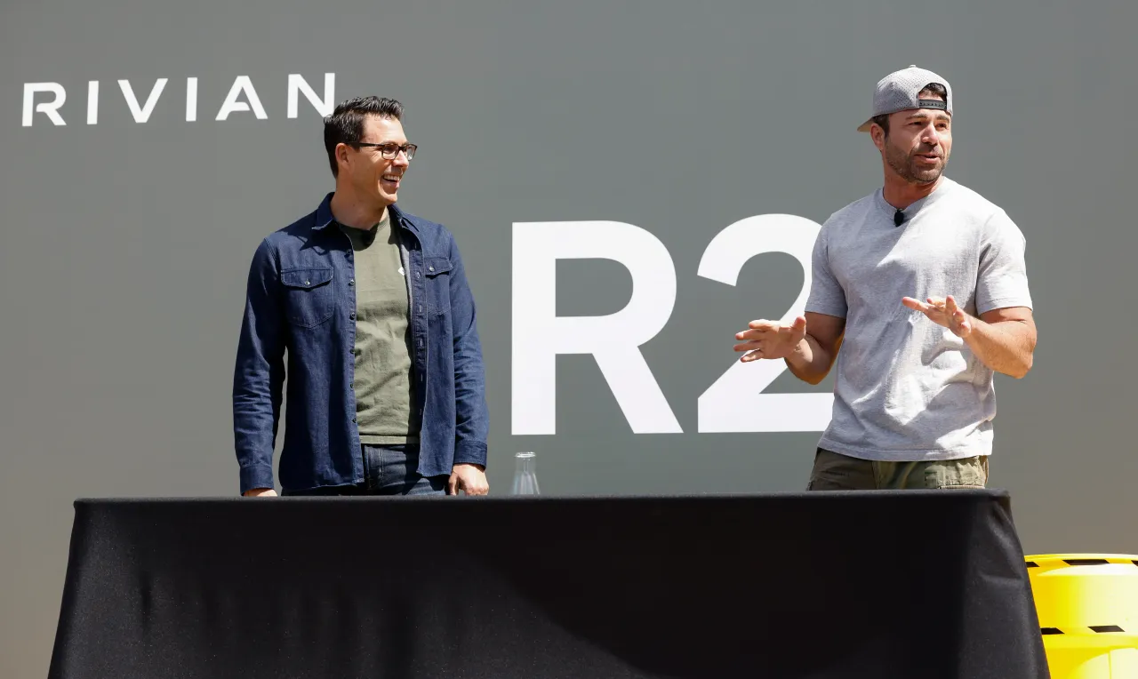 RJ Scaringe (L), Rivian founder and CEO, and Mark Rober attend the Rivian R2 Block Party Finale at Rivian San Francisco on June 06, 2026 in San Francisco, California. (Photo by Kimberly White/Getty Images for Rivian)