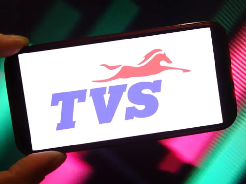In this photo illustration, the TVS Motor company logo is seen displayed on a smartphone screen. (Photo Illustration by Piotr Swat/SOPA Images/LightRocket via Getty Images)