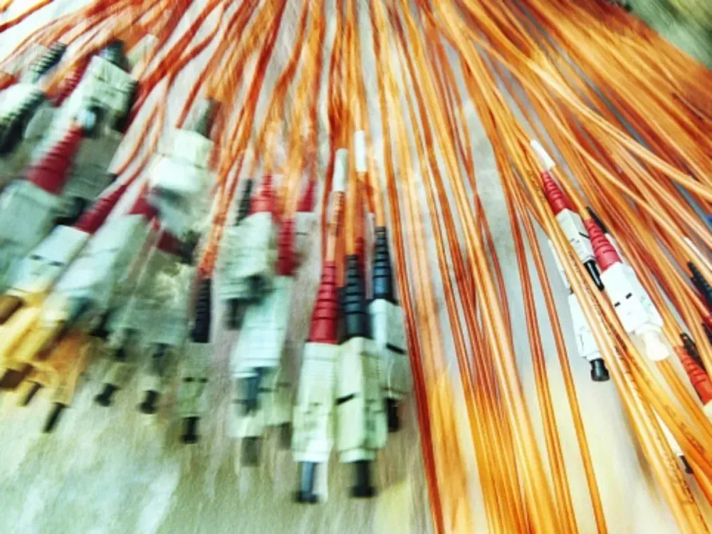 Generic computer cables hang from the wall, 3 June 2002. AFR Picture by ERIN JONASSON (Photo by Fairfax Media via Getty Images via Getty Images)