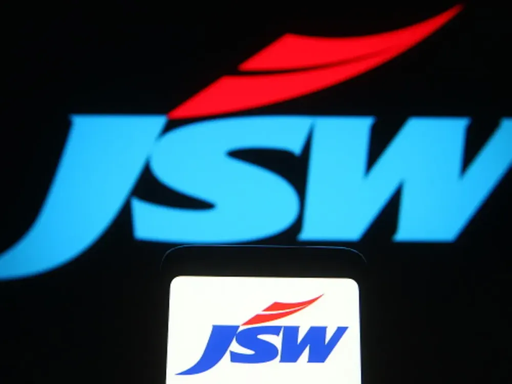 In this photo illustration, JSW Steel logo of an Indian iron and steel mills company is seen displayed on a smartphone and pc screen. (Photo Illustration by Pavlo Gonchar/SOPA Images/LightRocket via Getty Images)
