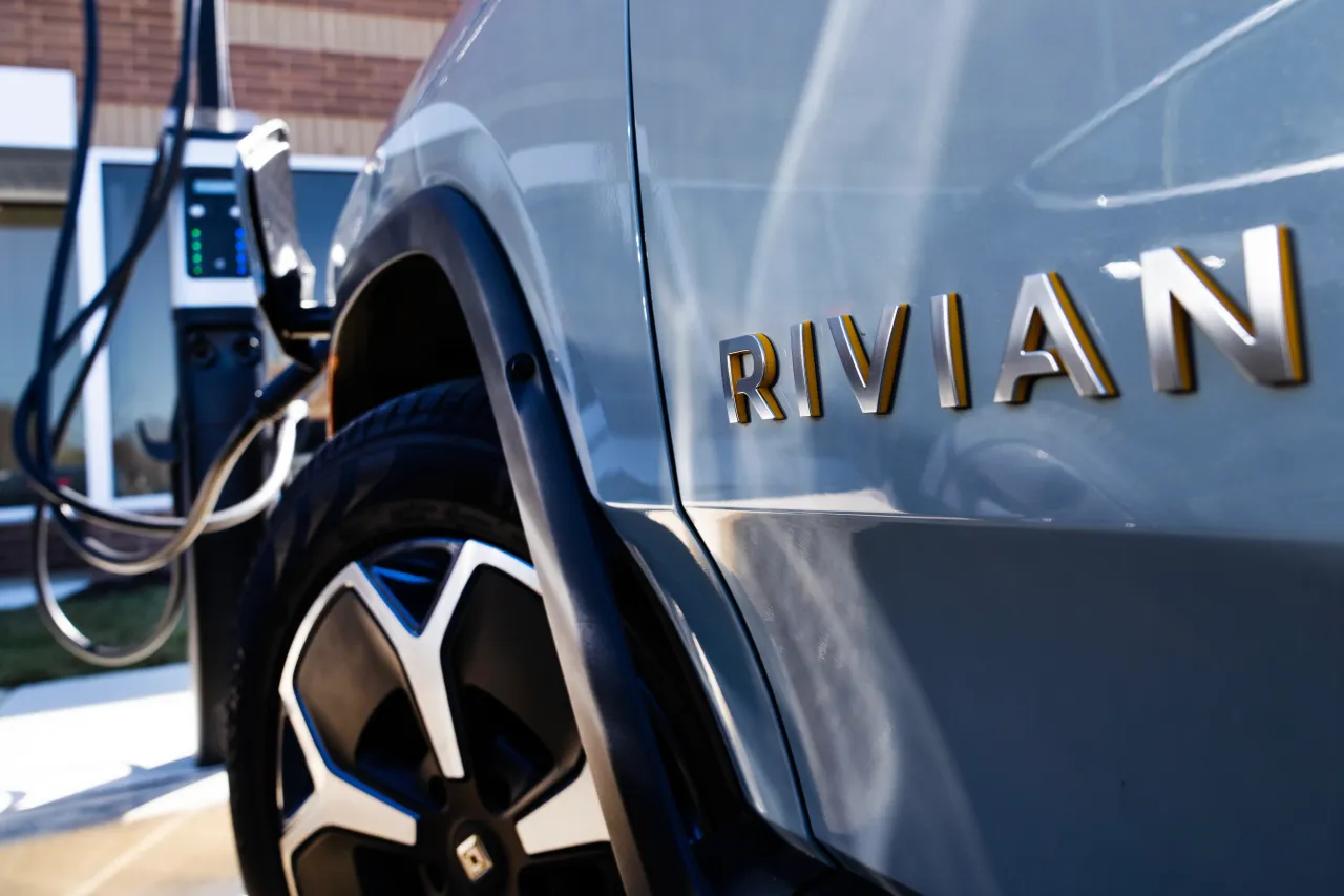 A Rivian charges outside of Blink Charging's new flagship manufacturing facility in Bowie, Md., on Monday March 11, 2024. (Tom Williams/CQ-Roll Call, Inc via Getty Images)