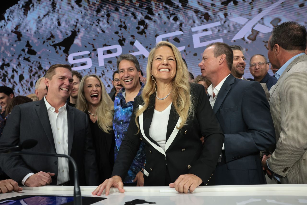 Gwynne Shotwell (C), President of SpaceX, is joined by company leadership as they ring the opening bell at the Nasdaq Marketsite at the launch of the company's initial public offering (IPO) on June 12, 2026 in New York City. (Photo by Spencer Platt/Getty Images)