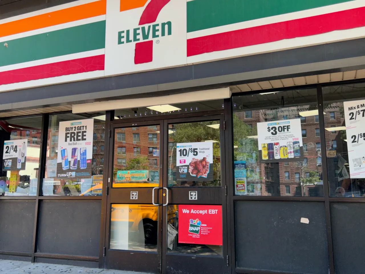 7 Eleven storefront with sign, We accept EBT and SNAP, Queens, New York