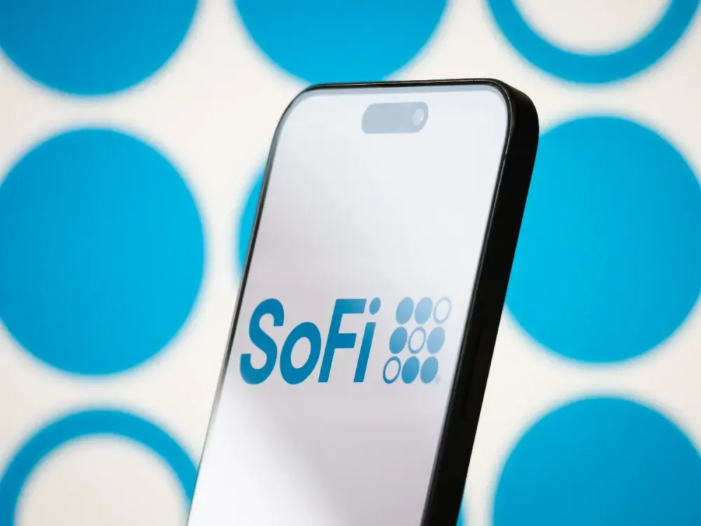 In this photo illustration, the logo of SoFi Technologies, Inc. is displayed on a smartphone screen, on April 23, 2025, in Chongqing, China. (Photo illustration by Cheng Xin/Getty Images)