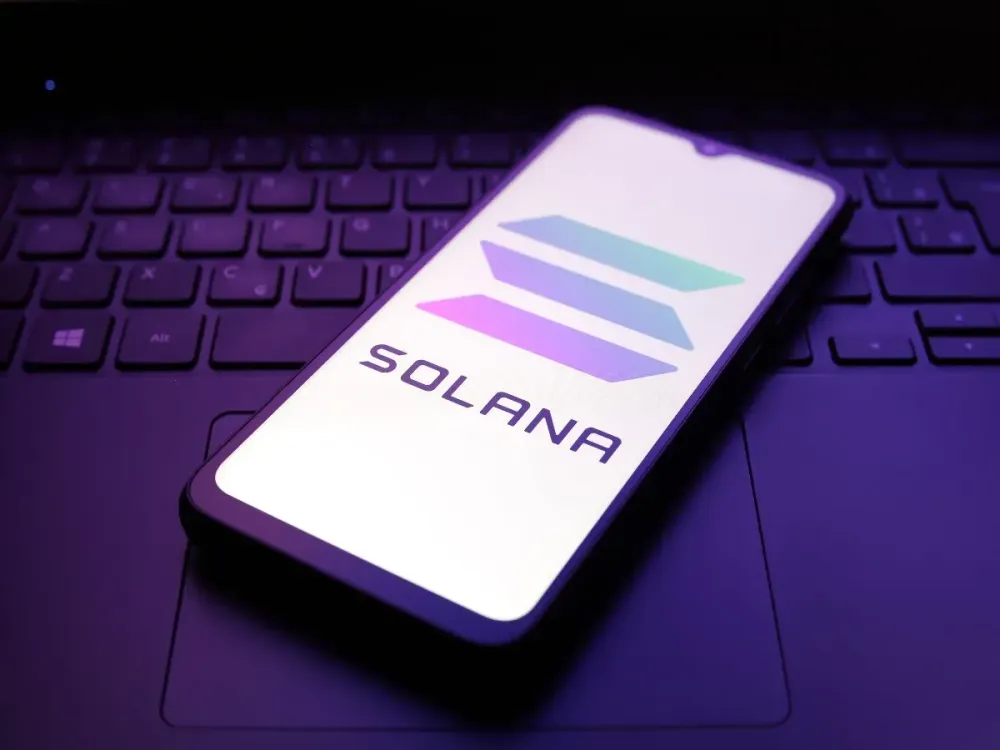 The Solana logo appears on the screen of a smartphone in Reno, United States, on December 5, 2024. (Photo by Jaque Silva/NurPhoto via Getty Images)