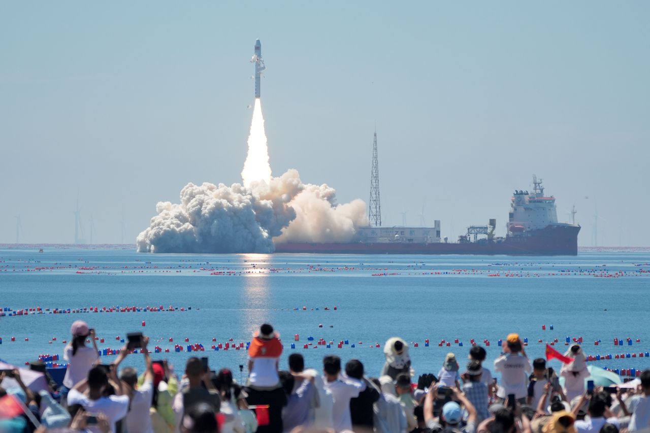 A Smart Dragon-3 carrier rocket carrying the Oriental Smart Eye hyperspectral satellites 01 and 02 lifts off from the waters on August 5, 2026 in China. (Photo by Tang Ke/VCG via Getty Images)