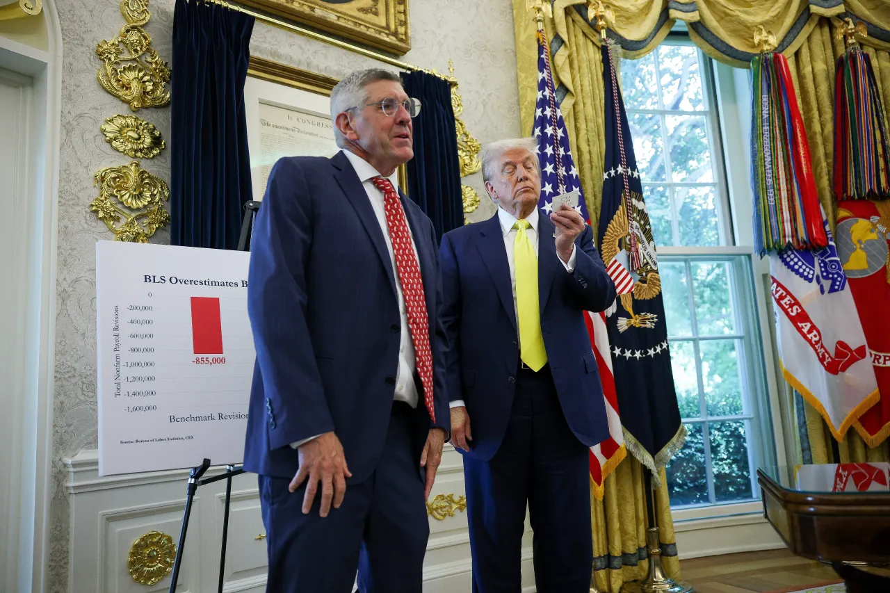 Heritage Foundation Senior Visiting Fellow for Economics Stephen Moore (L), accompanied by U.S. President Donald Trump (R)