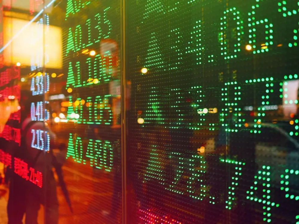 Representative image of a stock exchange market display screen board on the street showing stocks rising. (Photo by d3sign via Getty Images)