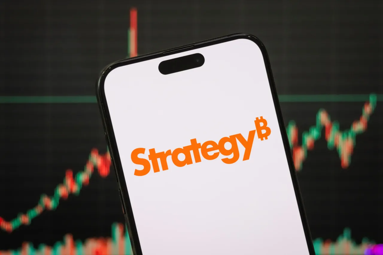 In this photo illustration, the logo of Strategy Inc is displayed on a smartphone screen