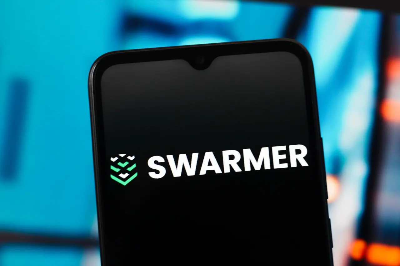 In this photo illustration, the Swarmer logo is seen displayed on a smartphone screen. (Photo Illustration by Thomas Fuller/SOPA Images/LightRocket via Getty Images)