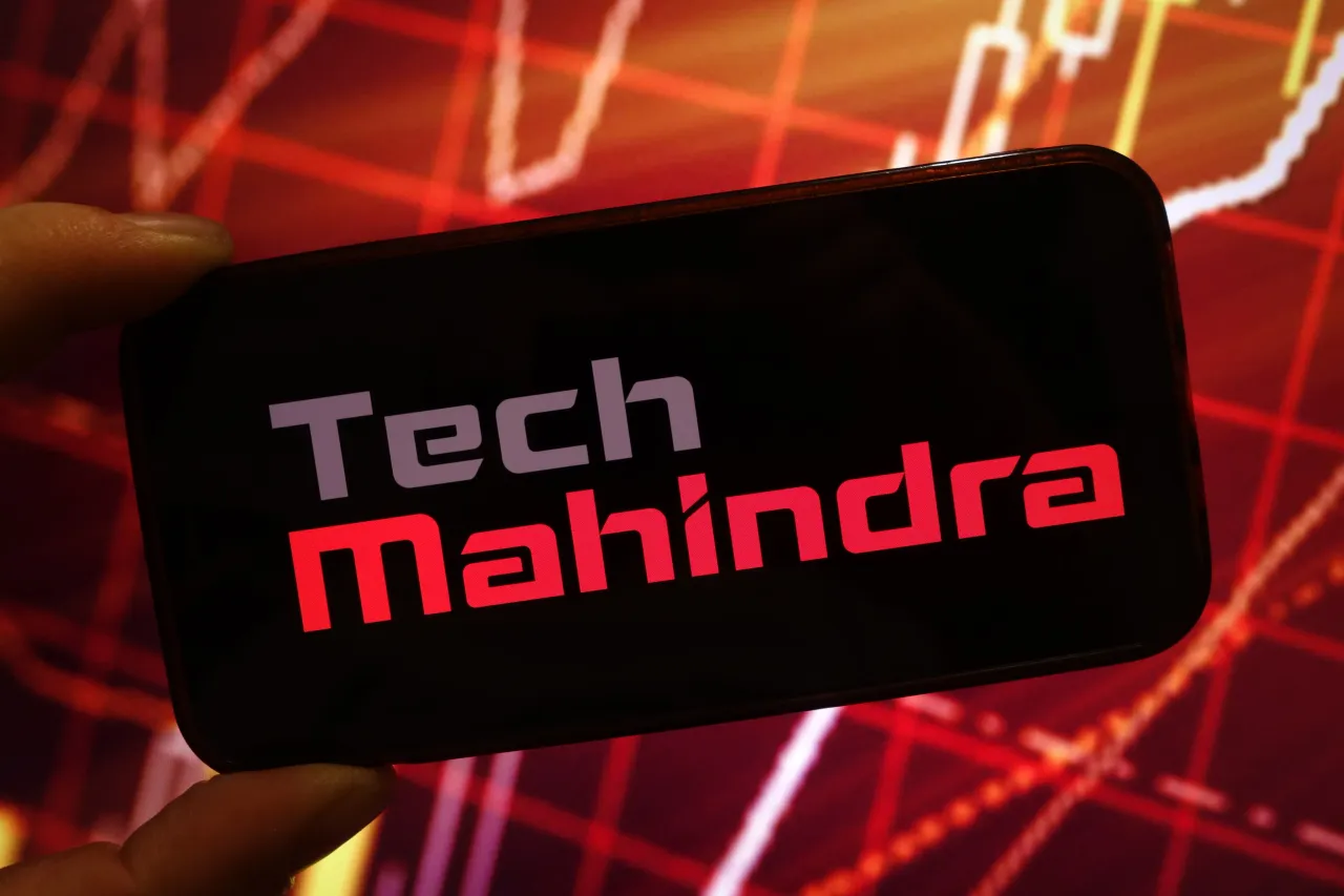 In this photo illustration, the Tech Mahindra company logo is seen displayed on a smartphone screen. (Photo Illustration by Piotr Swat/SOPA Images/LightRocket via Getty Images)