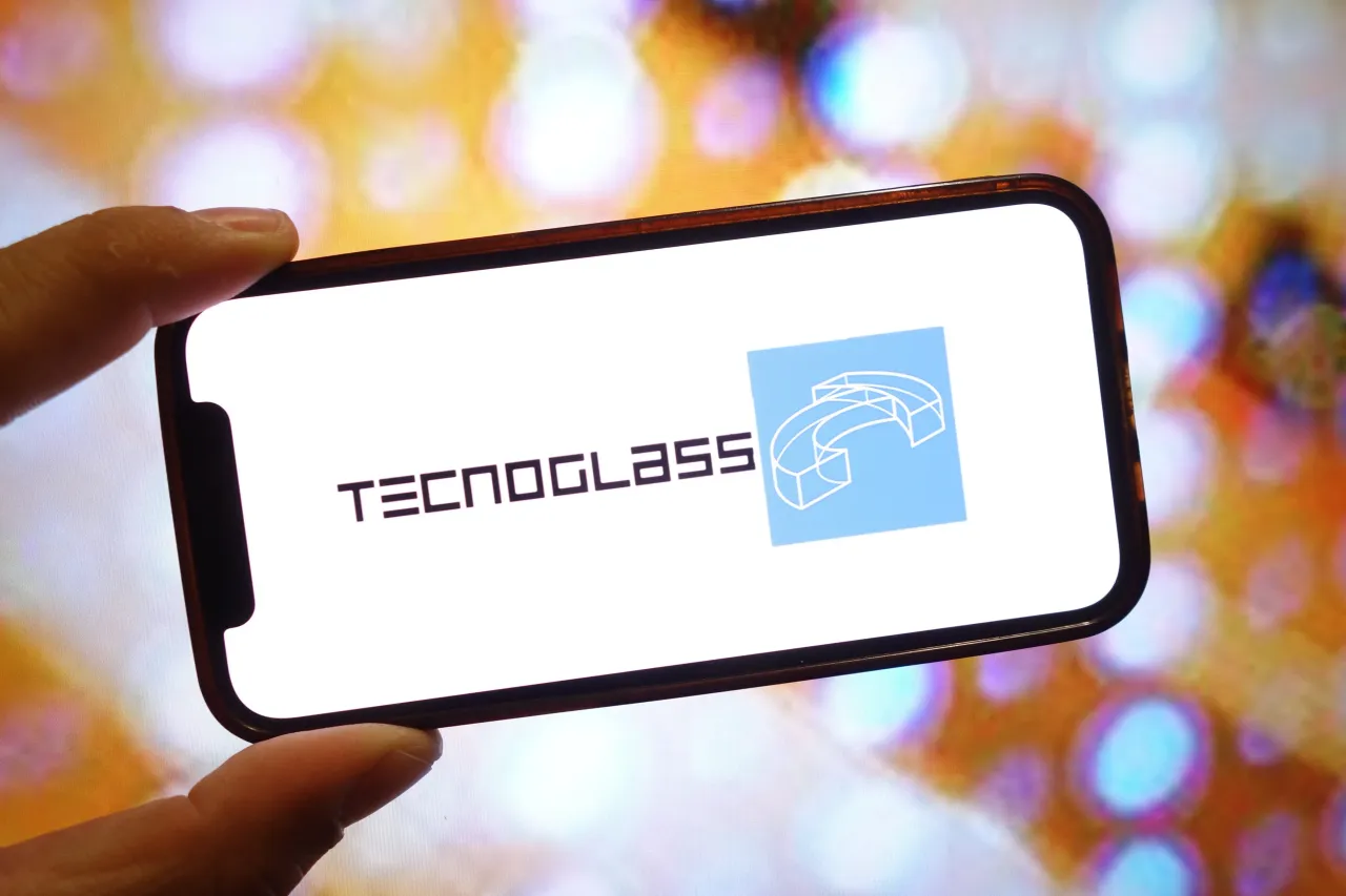 In this photo illustration, a Tecnoglass company logo is seen displayed on a smartphone screen
