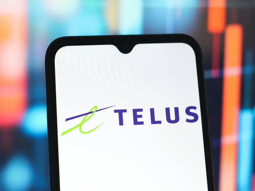  In this photo illustration, the Telus Corporation logo is seen displayed on a smartphone screen. 
