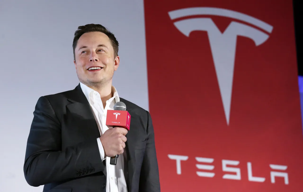Tesla Motors CEO Elon Musk speaks to the media next to its Model S during a press conference in Hong Kong. 25JAN16 SCMP/ Nora Tam (Photo by Nora Tam/South China Morning Post via Getty Images)