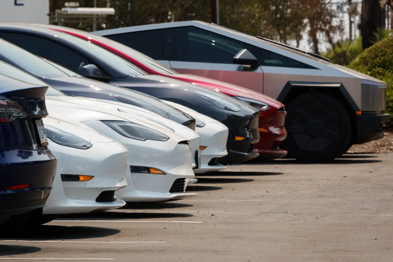 Tesla electric vehicles are parked at a Tesla service center on August 2, 2025 in San Diego, California. (Photo by Kevin Carter/Getty Images)