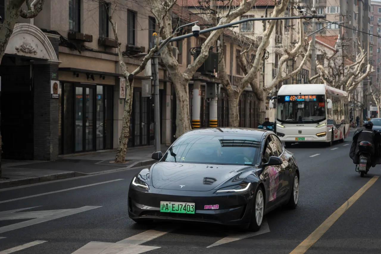 Tesla Model 3 vehicle drives on the street on February 27, 2025 in Shanghai, China. (Photo by Dai Aochen/VCG via Getty Images)