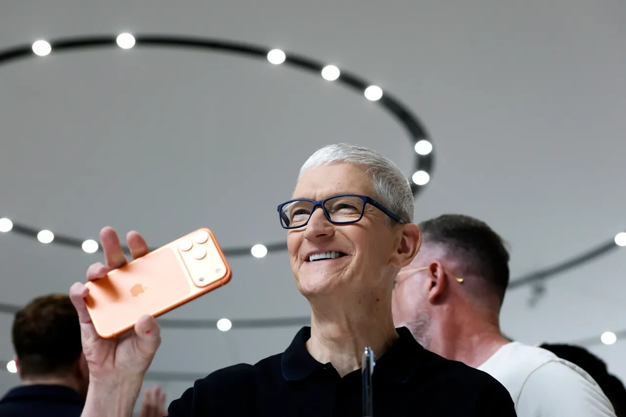 Apple CEO Tim Cook holds a next generation iPhone 17 during an Apple special event at Apple headquarters on September 09, 2025 in Cupertino, California. (Photo by Justin Sullivan/Getty Images)