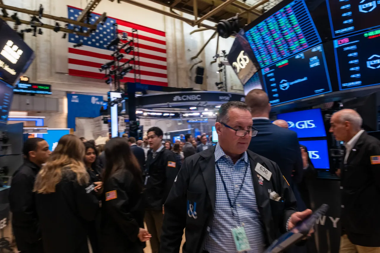 Traders work on the floor of the New York Stock Exchange (NYSE) on October 01, 2025, in New York City.