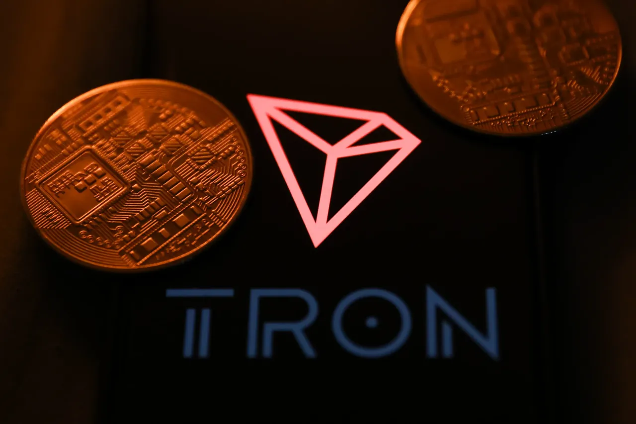 Representation of cryptocurrency and Tron logo displayed on a phone screen are seen in this illustration photo taken in Krakow, Poland on June 26, 2023. (Photo by Jakub Porzycki/NurPhoto via Getty Images)