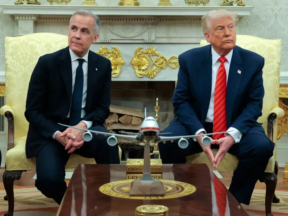 U.S. President Donald Trump speaks to reporters alongside Canadian Prime Minister Mark Carney in the Oval Office at the White House on May 6, 2025 in Washington, DC. (Photo by Anna Moneymaker/Getty Images)