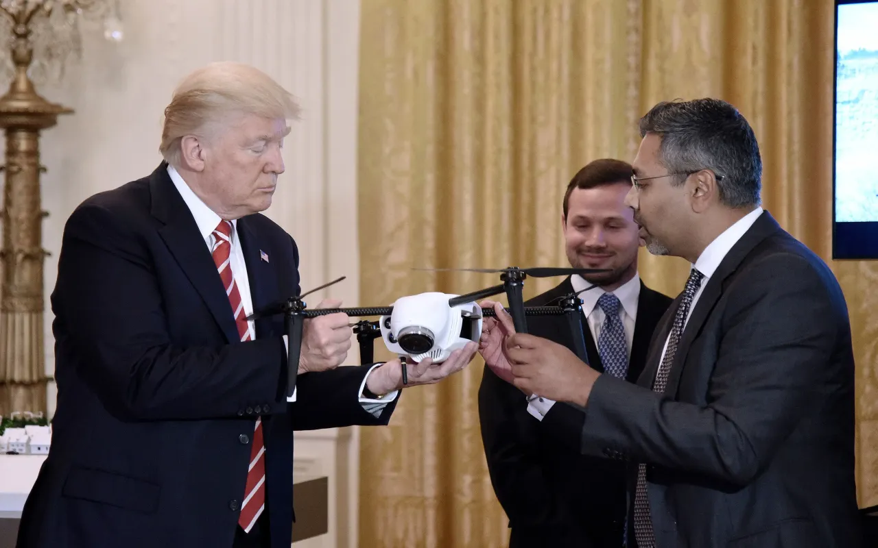 U.S President Donald Trump holds a drone at the American Leadership in Emerging Technology Event in the East Room of the White House on June 22, 2017. (Photo by Olivier Douliery-Pool/Getty Images)
