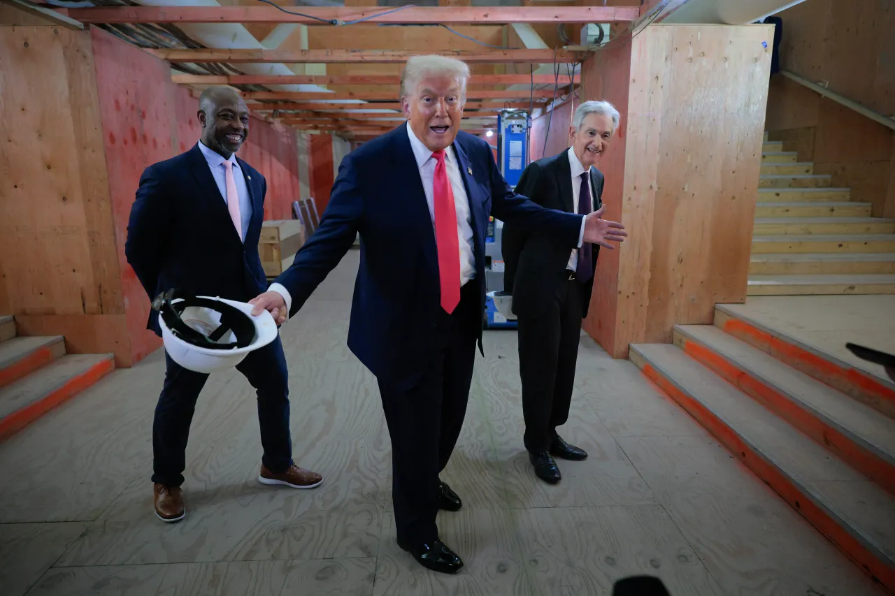 U.S. Sen. Tim Scott, President Donald Trump and Federal Reserve Chair Jerome Powell tour the Federal Reserve’s $2.5 billion headquarters renovation project on July 24, 2025 in Washington, DC. (Photo by Chip Somodevilla/Getty Images)