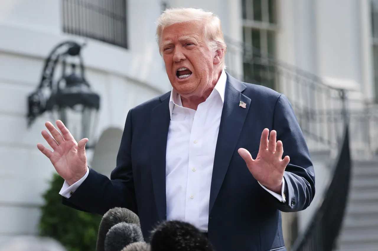 U.S. President Donald Trump answers questions while departing the White House on July 11, 2025 in Washington, DC. (Photo by Win McNamee/Getty Images)