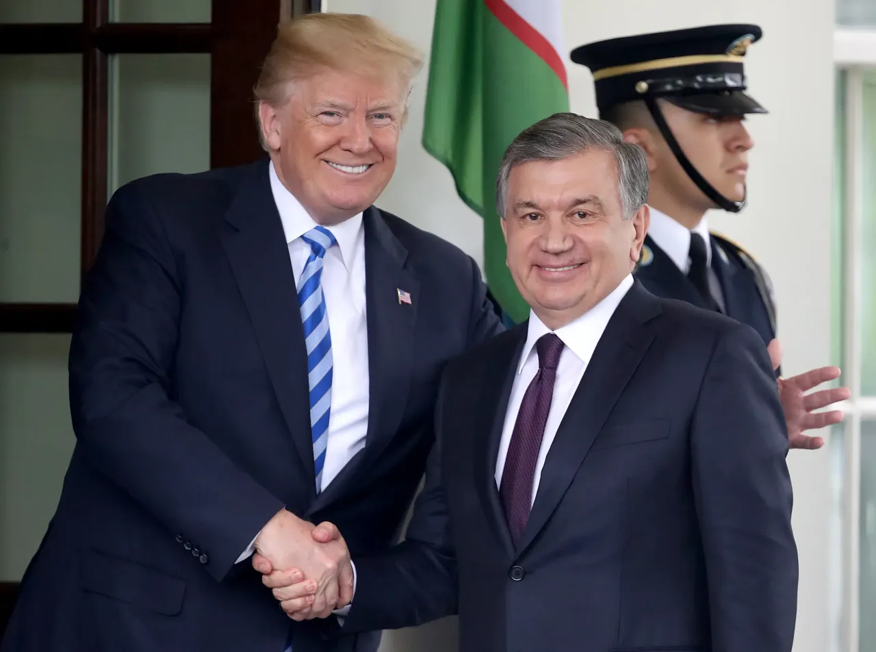 U.S. President Donald Trump greets Uzbekistan President Shavkat Mirziyoyev at the White House May 16, 2018. (Photo by Win McNamee/Getty Images)