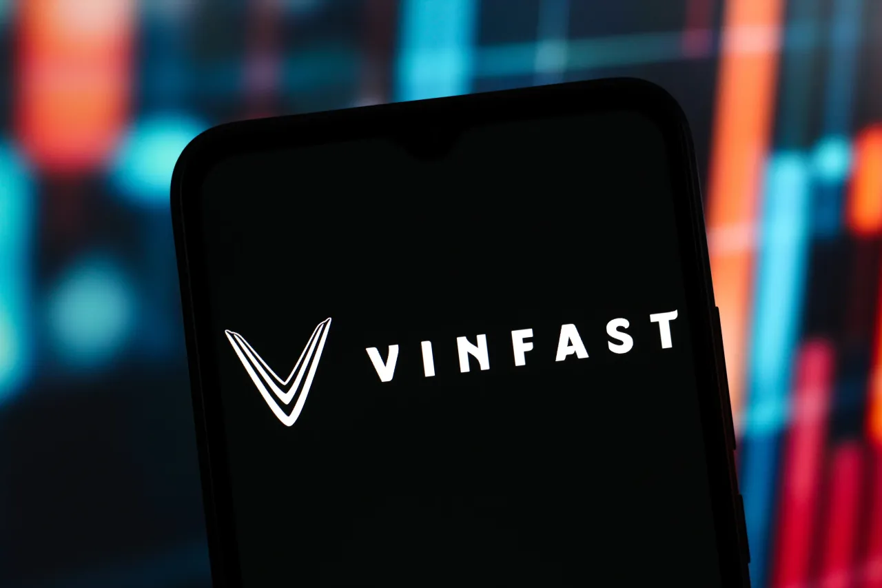 In this photo illustration, the VinFast (Vin Fast) logo is seen displayed on a smartphone screen. (Photo Illustration by Thomas Fuller/SOPA Images/LightRocket via Getty Images)