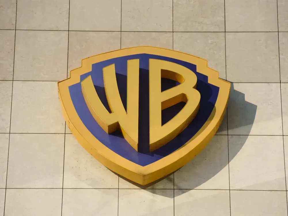 A Warner Bros (Discovery) sign is being pictured at the TVN broadcaster headquarters in Warsaw, Poland
