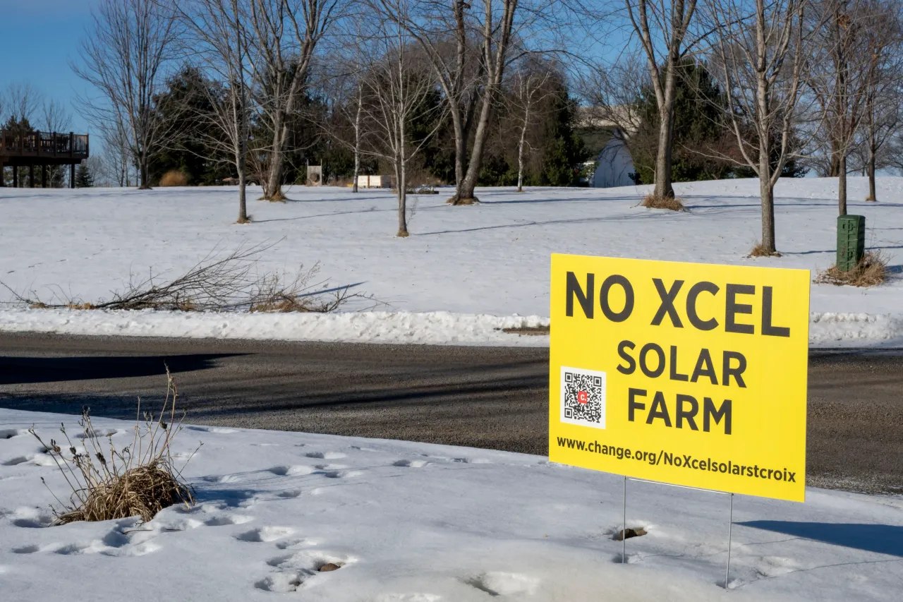 People protest an Xcel Energy solar project because of its size and its proximity to residential areas. (Photo by: Michael Siluk/UCG/Universal Images Group via Getty Images)