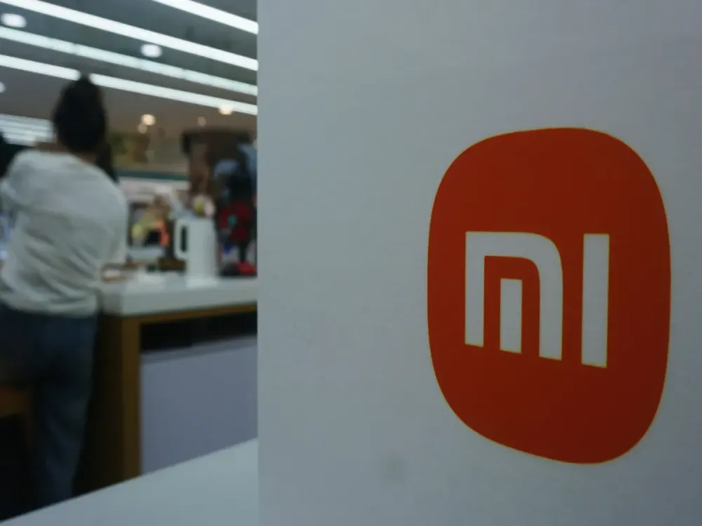 A customer is choosing a Xiaomi mobile phone in a supermarket in Hangzhou, Zhejiang Province, China on May 27, 2025. (Photo credit should read CFOTO/Future Publishing via Getty Images)