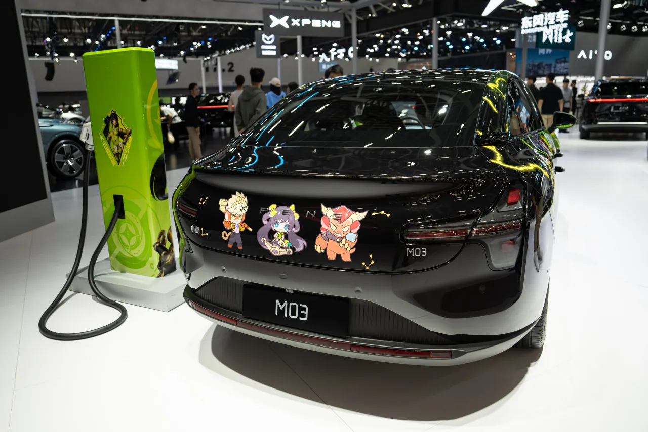 The Xpeng Inc. Mona M03 electric vehicle is on display during the 2024 Guangzhou International Automobile Exhibition on Nov. 25, 2024 (Photo by John Ricky/Anadolu via Getty Images)