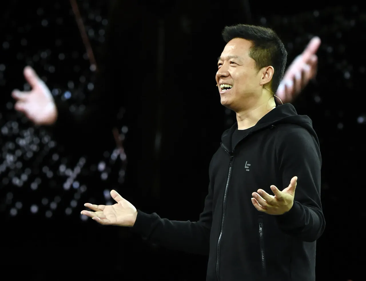 LeEco Founder and CEO YT Jia unveils Faraday Future's FF 91 prototype electric crossover vehicle during a press event for CES 2017 on January 3, 2017. (Photo by Ethan Miller/Getty Images)