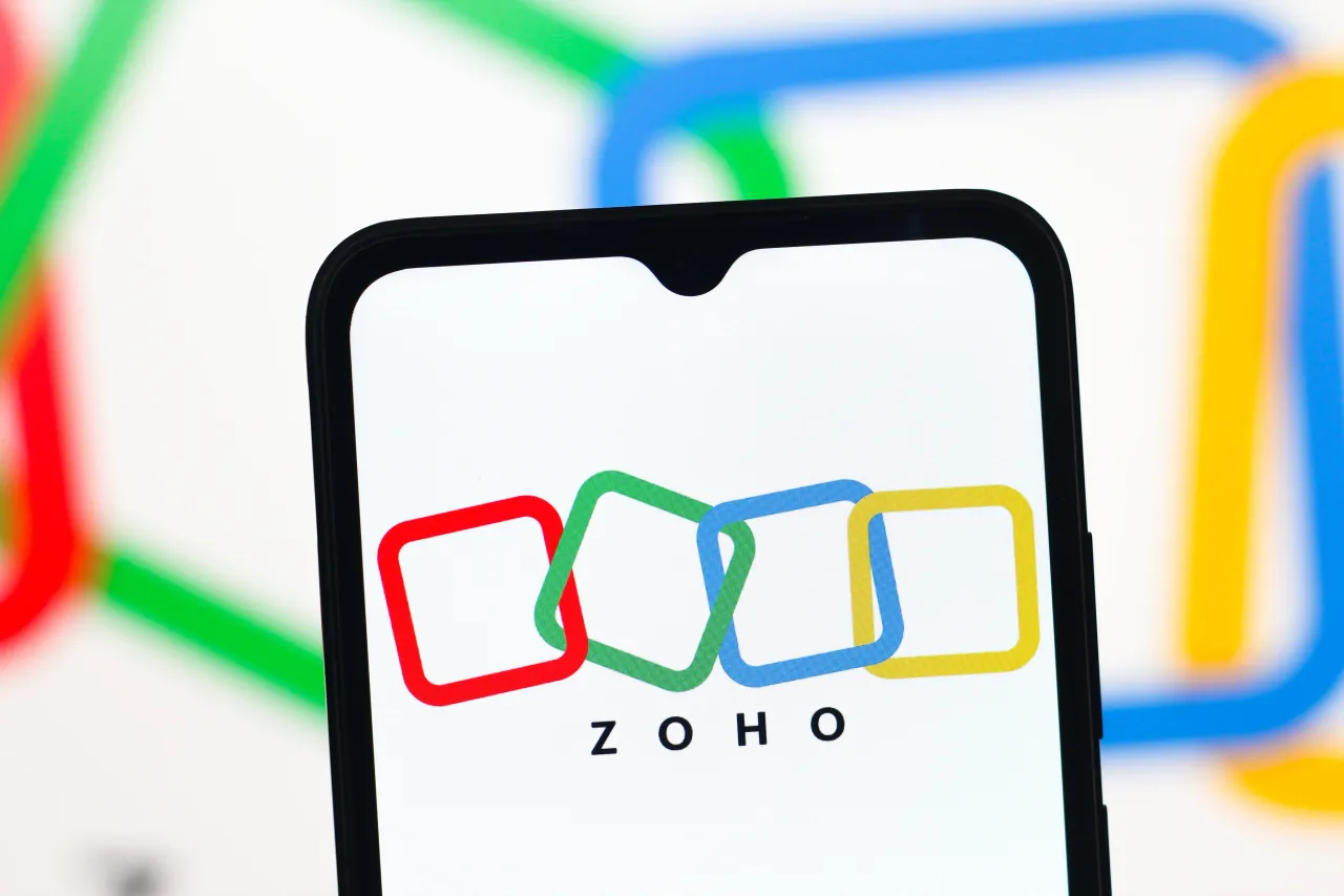 In this photo illustration, the Zoho Corporation logo is seen displayed on a smartphone screen