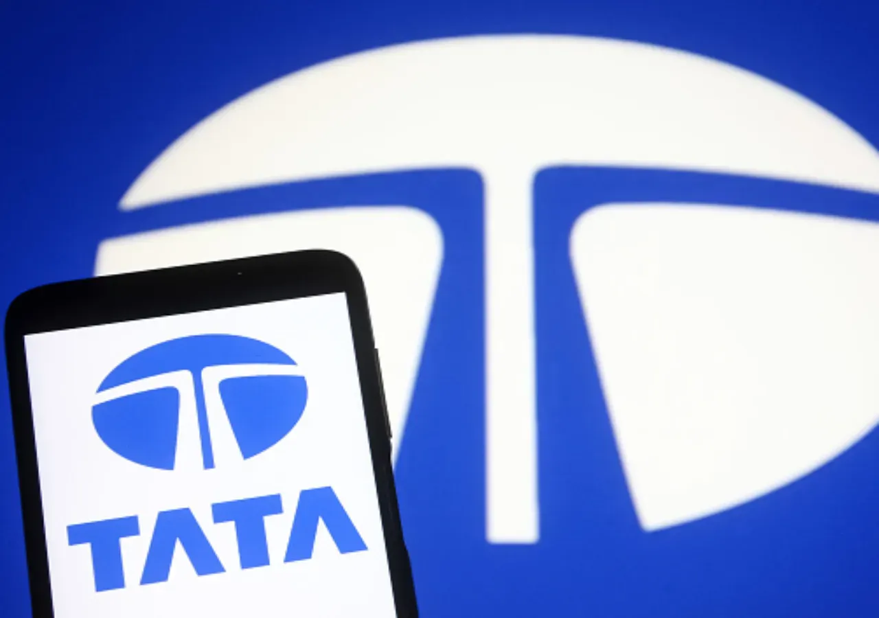 In this photo illustration a Tata Group logo is seen on a smartphone and a pc screen. (Photo Illustration by Pavlo Gonchar/SOPA Images/LightRocket via Getty Images)