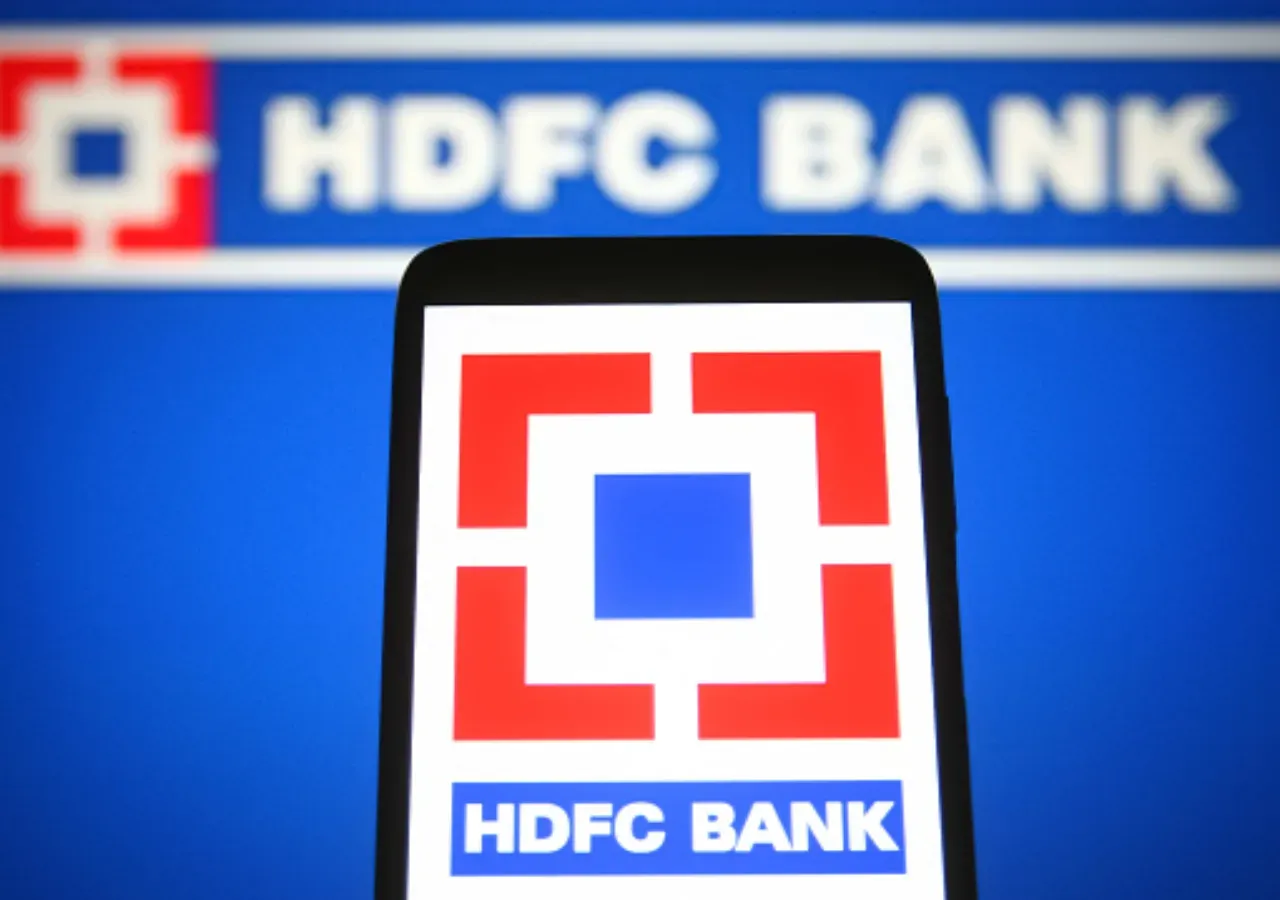 In this photo illustration, HDFC Bank Limited logo is seen displayed on a smartphone and a pc screen. (Photo Illustration by Pavlo Gonchar/SOPA Images/LightRocket via Getty Images)