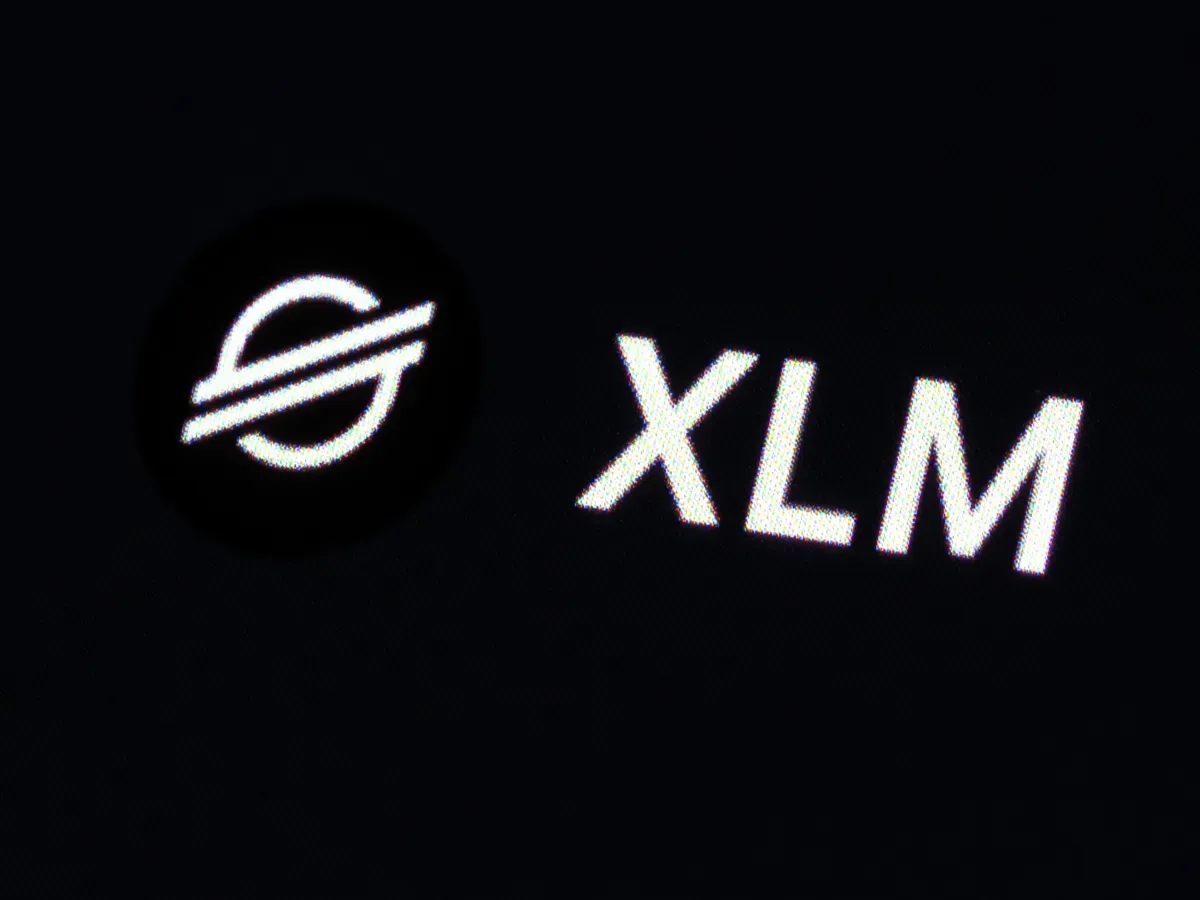 The logo of the cryptocurrency Stellar (XLM) can be seen on the CoinMarcetCap trading platform. Photo: Silas Stein/dpa (Photo by Silas Stein/picture alliance via Getty Images)