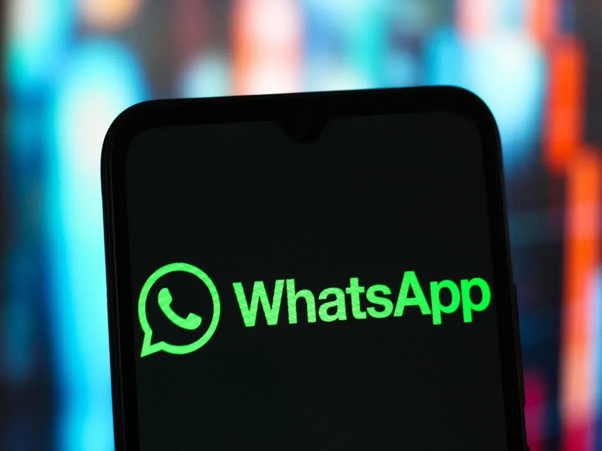 In this photo illustration, the WhatsApp logo is seen displayed on a smartphone screen.